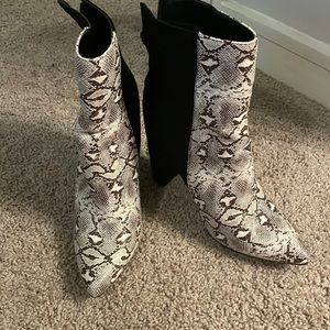 Snakeskin heel booties